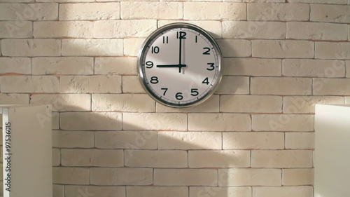 Wallpaper Mural Zoom out of electric clock on white brick wall in empty office Torontodigital.ca