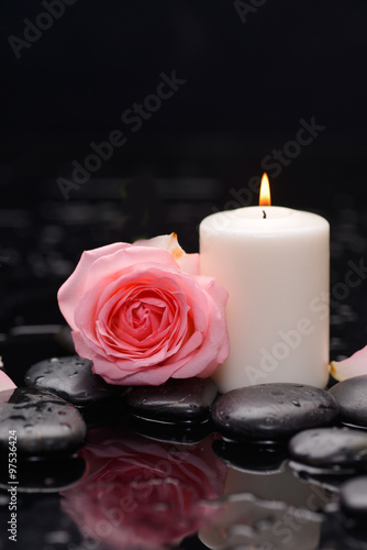 rose with candle and therapy stones 