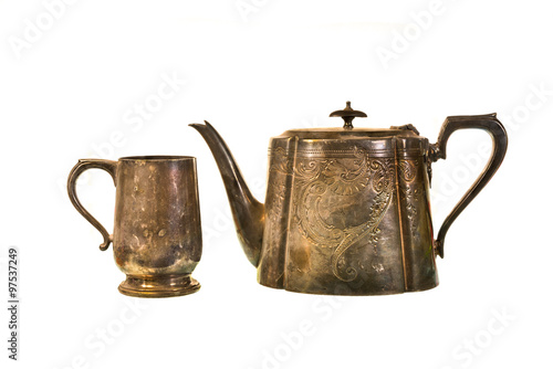 Old brass kettle and cup brass on white background