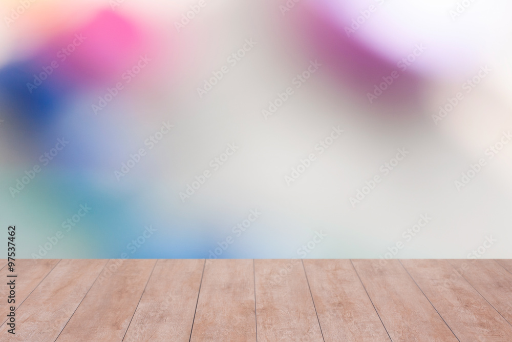 Wood table top on color abstract blurred background. ready for product display Wood table top on color abstract blurred background. ready for product display