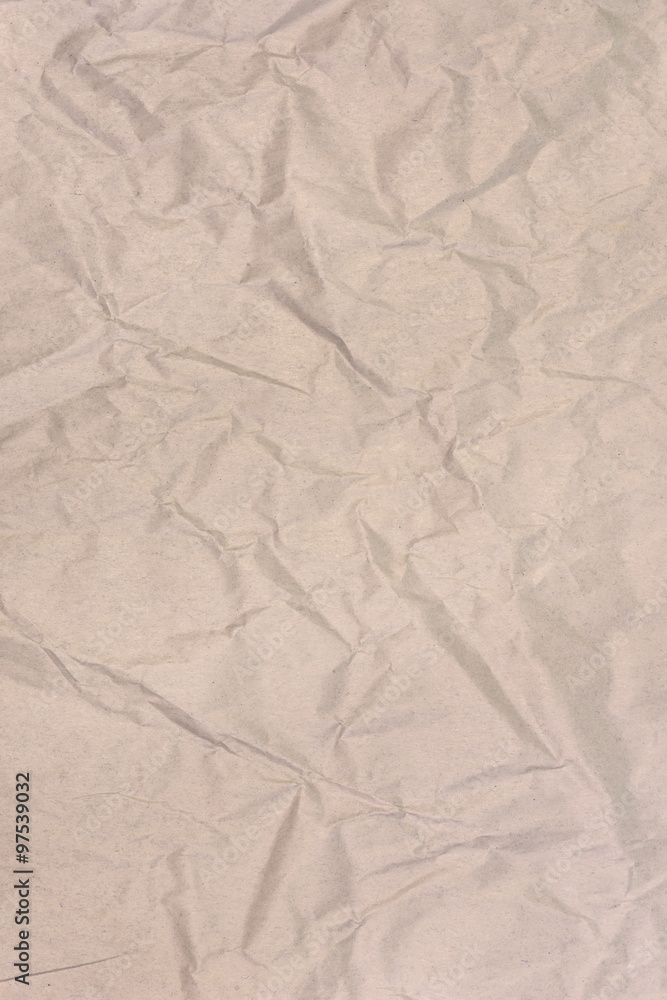 Brown wrinkled paper background Brown wrinkled paper background