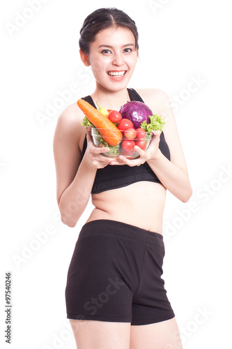 Healthy eating, happy young woman with vegetables on white background © japhoto