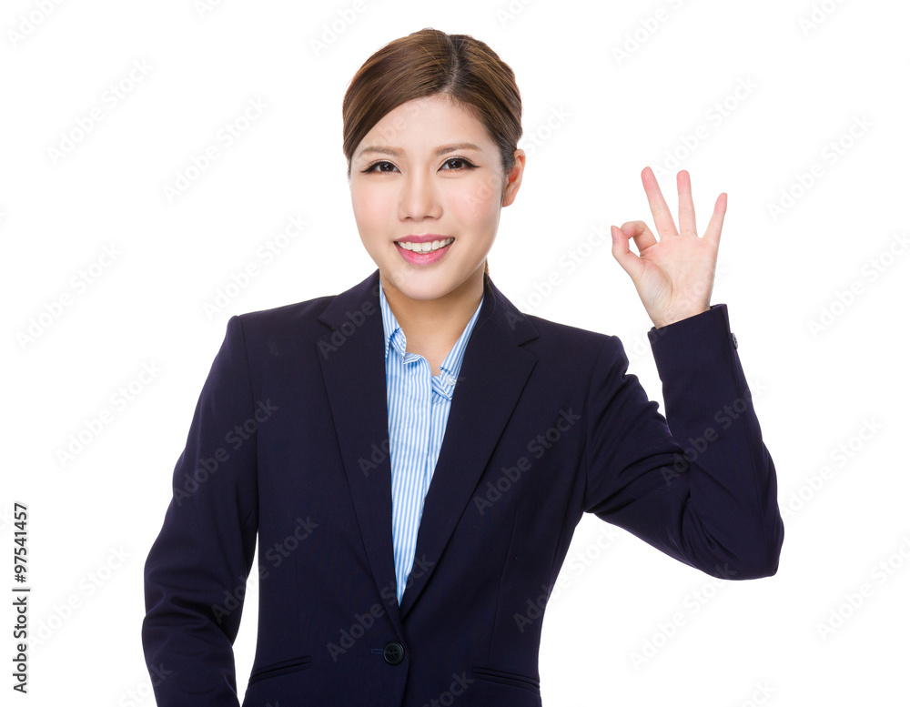 Young Businesswoman showing ok sign gesture Young Businesswoman showing ok sign gesture
