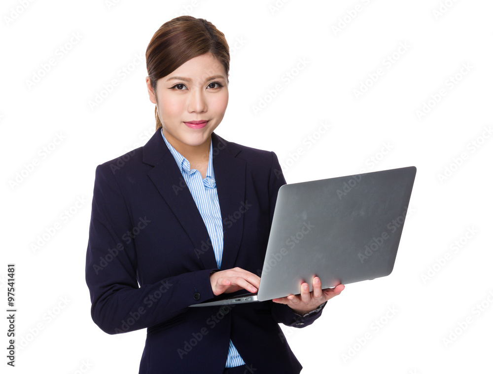 Asian Young Businesswoman use of the laptop computer Asian Young Businesswoman use of the laptop computer