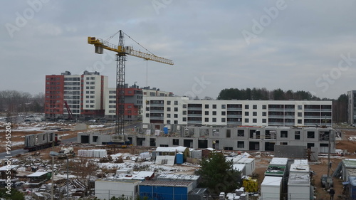 One year timelapse time lapse of construction site industrial works. Workers with cranes building block flat apartment house district. Static shot. 4K