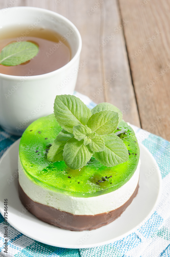 herbal tea with cake on wooden background. herbal tea with cake on wooden background.