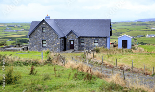 Rural farmhouses among farmland.