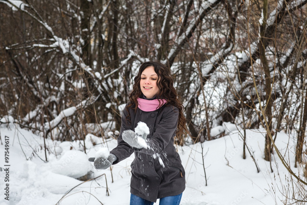 Beautiful girl throws snow Beautiful girl throws snow