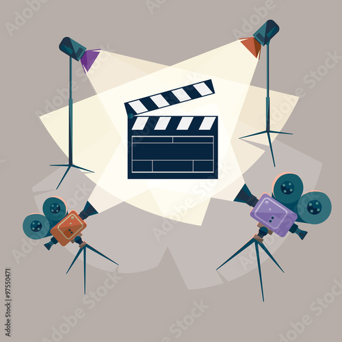 Cinema concept with spotlight and camera