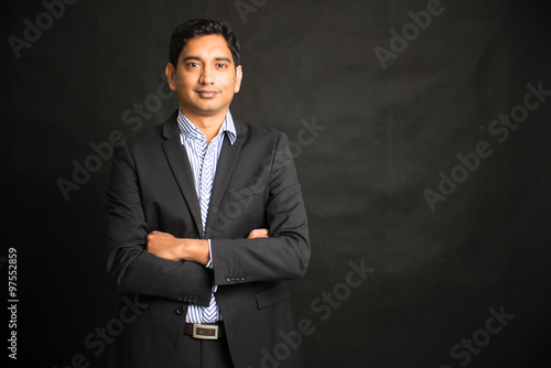 indian male businessman black background
