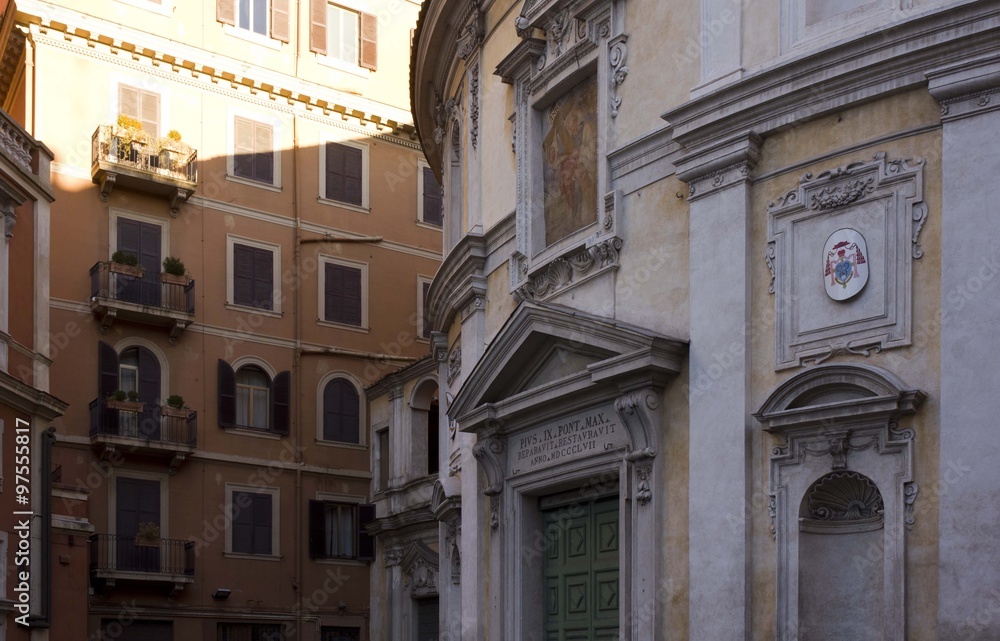 Close up of the entrance of San Bernardo alle Terme church in Rome, with the surroundings buildings in Rome