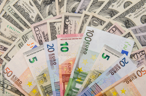 Banknotes of euros above dollars