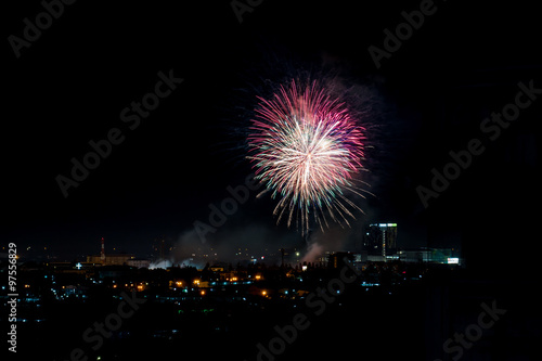 Brightly colorful fireworks and salute of various colors in the © Peerapixs