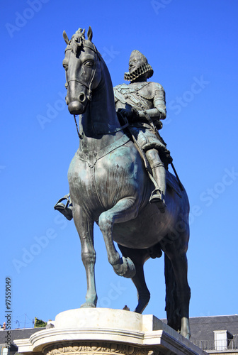 MADRID  SPAIN - AUGUST 23  2012  Bronze equestrian statue of King Philip III from 1616 at the Plaza Mayor in Madrid  Spain.