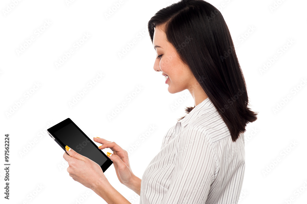 Smiling woman using tablet pc