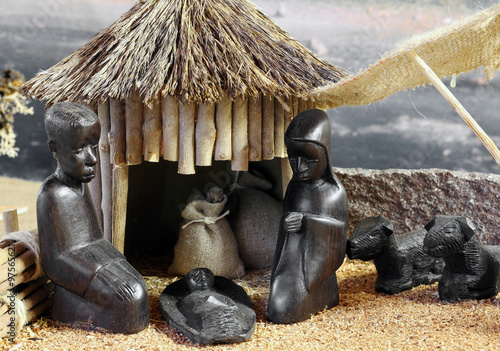 Картината върху платно african nativity scene with baby jesus joseph and mary in a hut