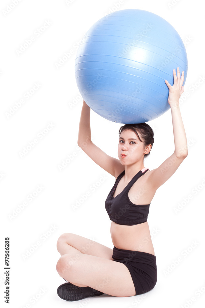 Young woman doing exercises with fitness ball. Young woman doing exercises with fitness ball.