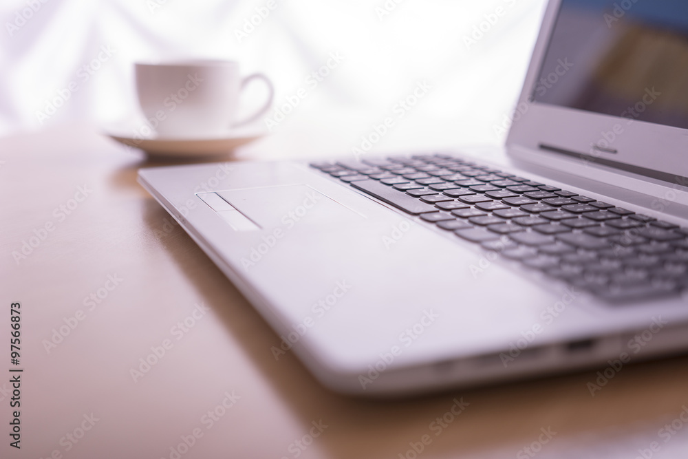 Office desk selective focus on laptop keyboard Office desk selective focus on laptop keyboard