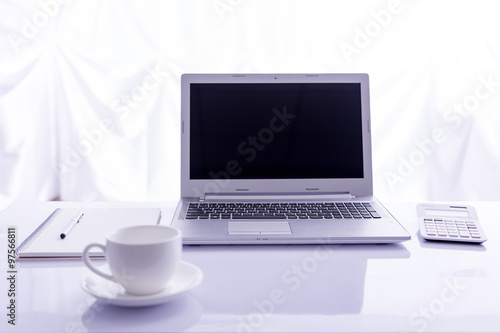 Office desk selective focus on laptop keyboard © Dreamstudios