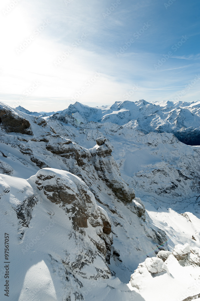 Scenery of snow covered mountains valley Titlis, Engelberg, Switzerland