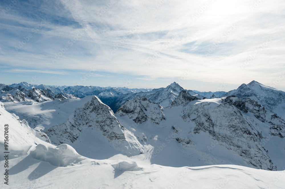 Scenery of snow covered mountains valley Titlis, Engelberg, Switzerland
