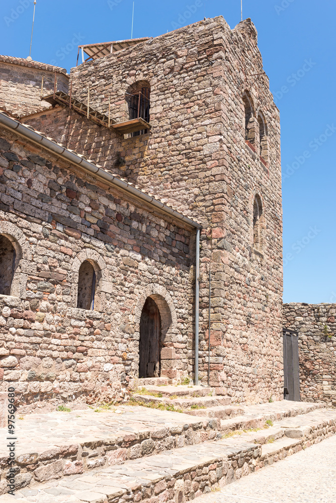 Monastery of Sant Llorenç del Munt, situated on top of La Mola, the summit of the rocky mountain massif. The original monastery built in the mid-11th century is Catalan Romanesque style
