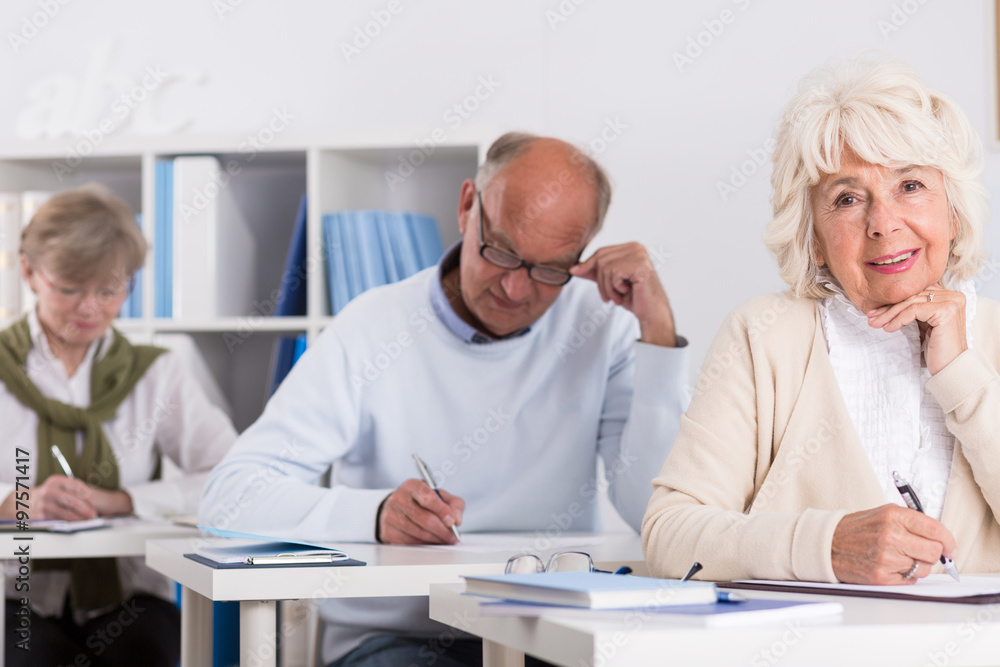 Fototapeta premium Mature students writing an exam