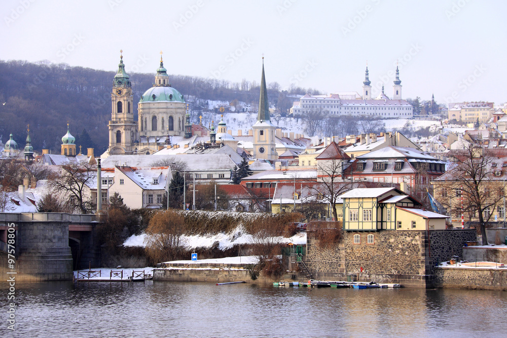 Romantic snowy Prague St. Nicholas' Cathedral, Czech Republic