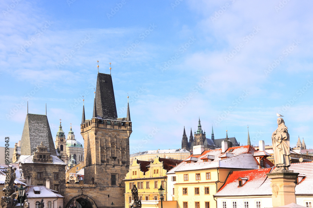Christmas snowy Prague gothic Castle above River Vltava in the sunny Day, Czech Republic