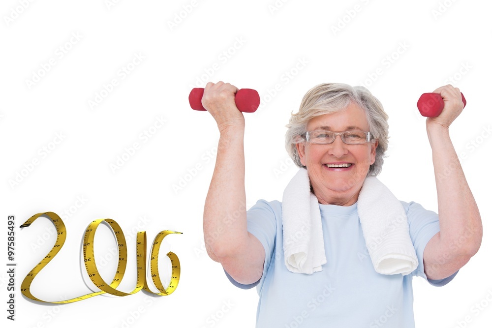 Composite image of senior woman lifting hand weights Composite image of senior woman lifting hand weights