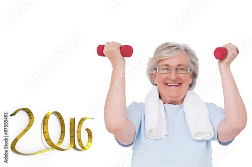 Composite image of senior woman lifting hand weights