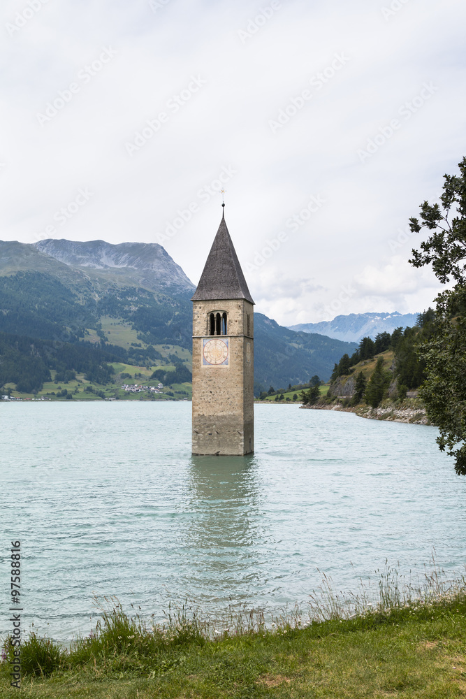 Bell Tower In Lake Reschen, Italy