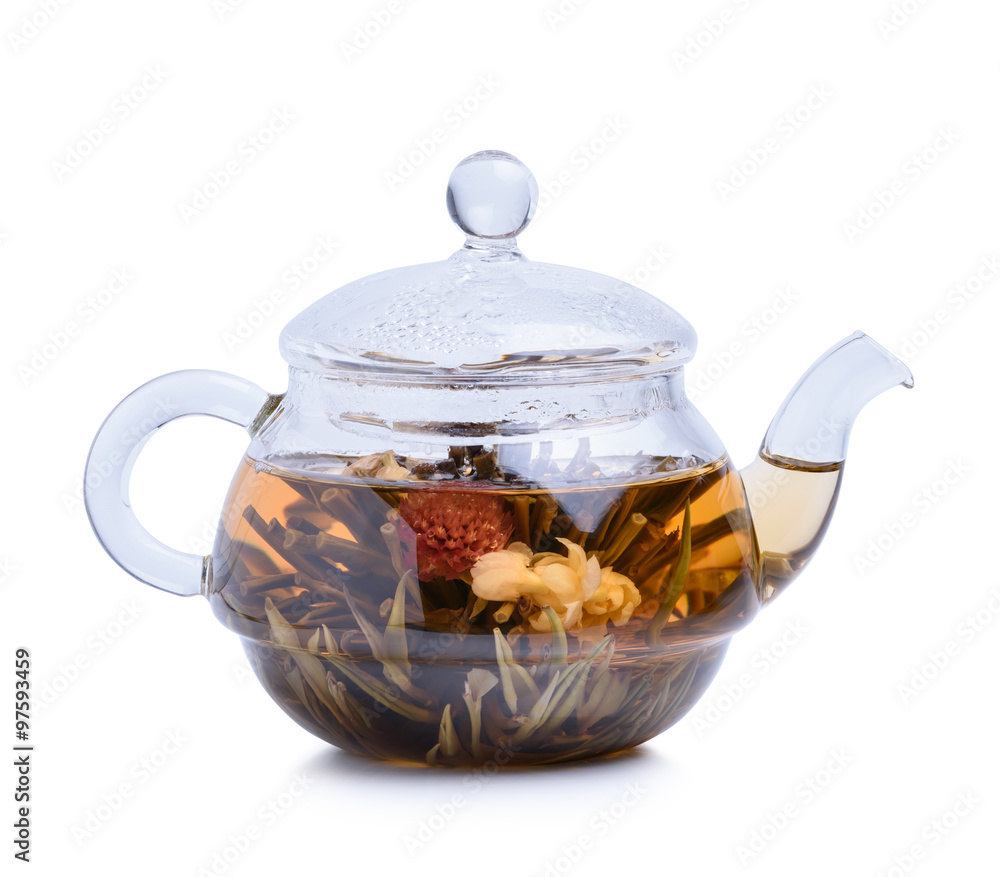 Hot tea in glass teapot isolated on white background Hot tea in glass teapot isolated on white background