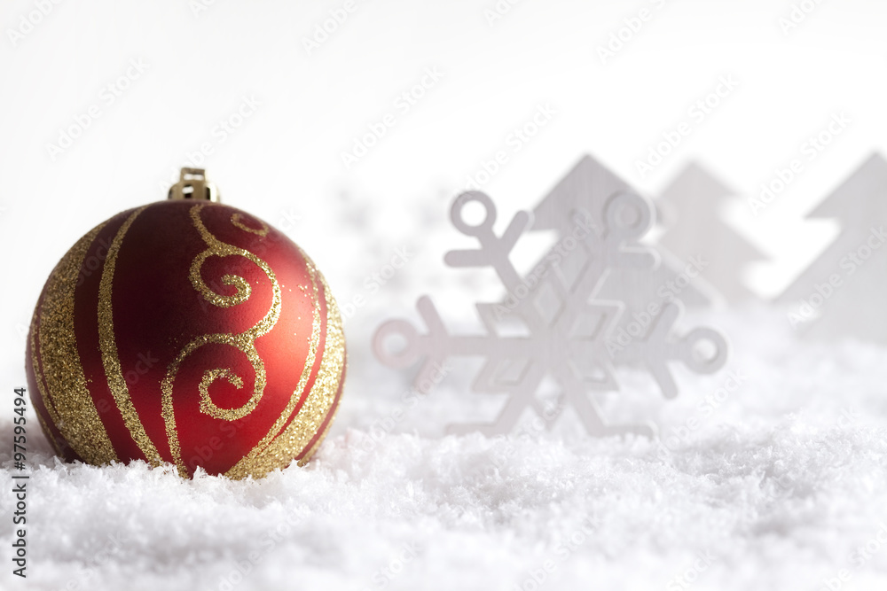 Christmas bauble on snow Christmas bauble on snow