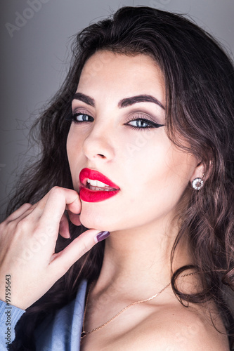 Fashion close up portrait of young model with beautiful make up 