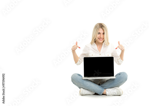 Young blonde woman showing blank laptop computer screen sitting © gawriloff