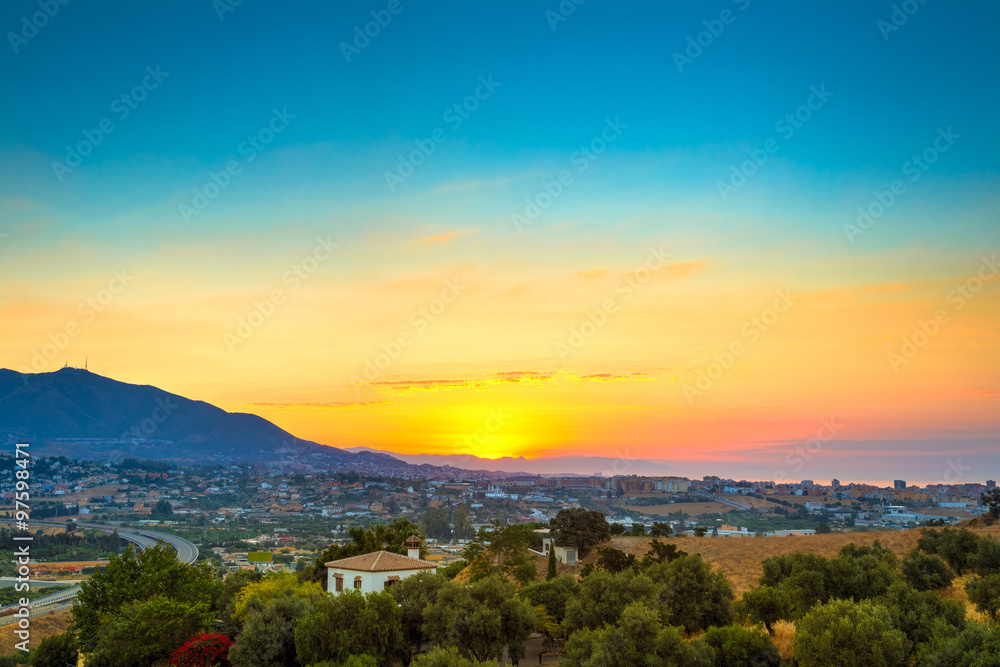Beautiful Sunset Over Mountain, Mediterranean sea and town Mijas