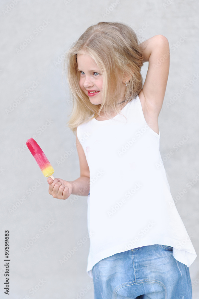 portrait of little girl outdoors in summer