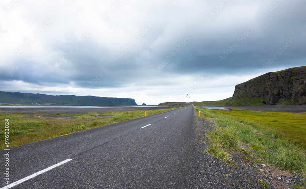 Icelandic landscapes with road and rock