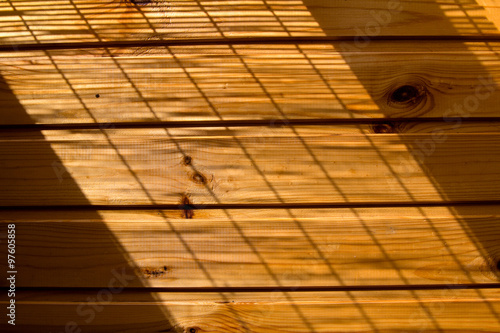 Wooden wall background in a morning light