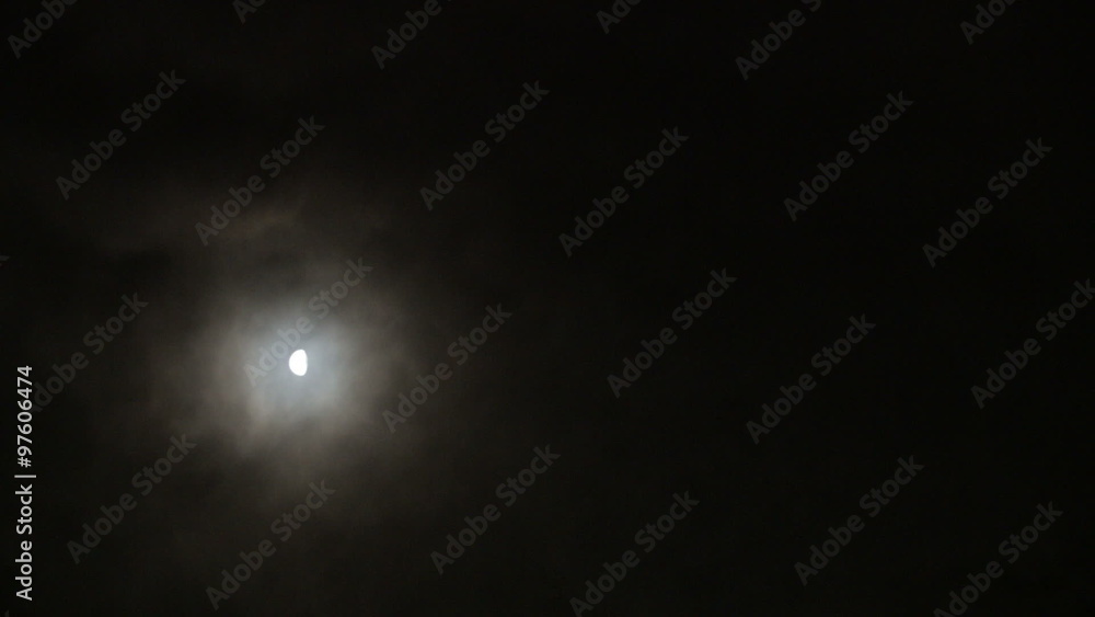 Fast Light Clouds and Half Moon at Night using a 50mm lens Fast Light Clouds and Half Moon at Night using a 50mm lens