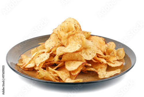 chips crisps on plate isolated on white