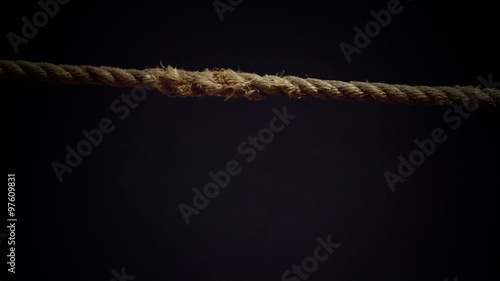 Tension of a Panic Attack Illustrated with Breaking Rope in Super Slow Motion