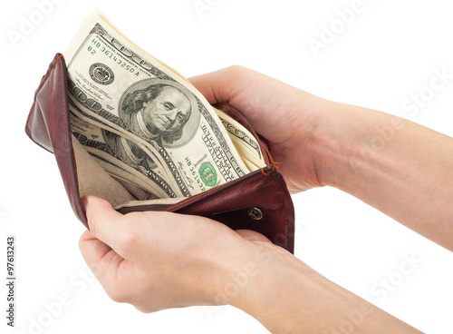 Purse with money in hands