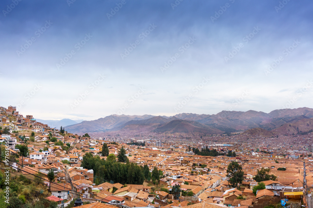 Cityscape against cloudy sky, Cusco, Peru