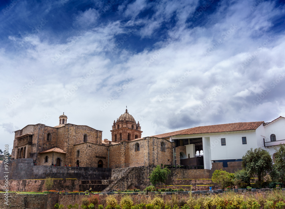 Low angle view of a church against cloudy sky, Cusco, Peru