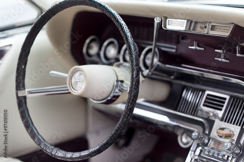 Close-up of steering wheel of a classic vintage car © bruno135_406