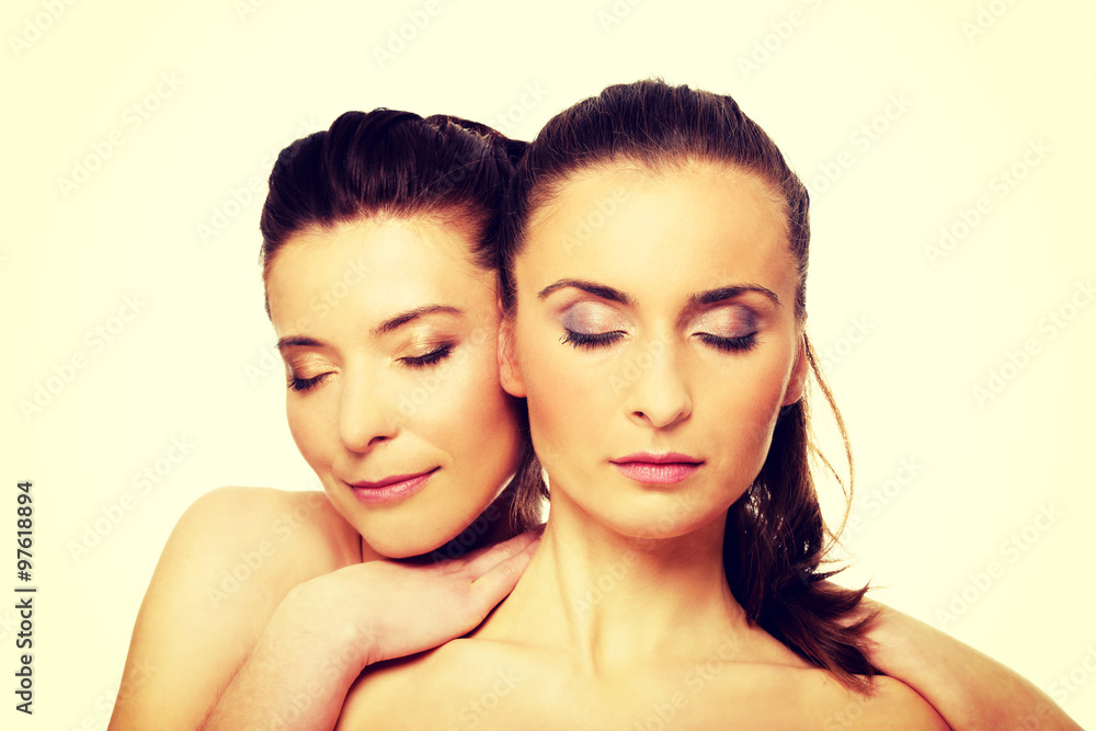 Two sisters with make up and eyes closed. Two sisters with make up and eyes closed.