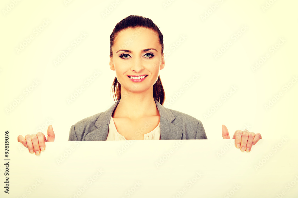 Business woman presenting empty banner. Business woman presenting empty banner.