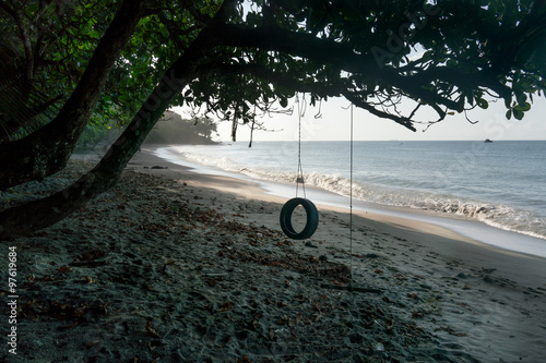 Tyre swing on the beach, Trinidad, Trinidad and Tobago
